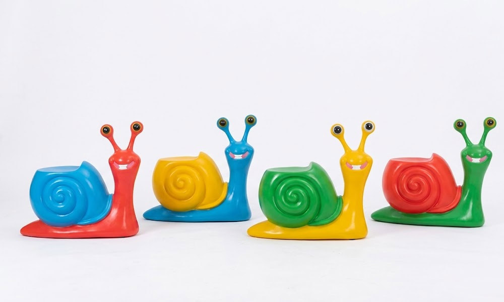 Vibrant Snail Statue Seats Fun Outdoor Animal Decor