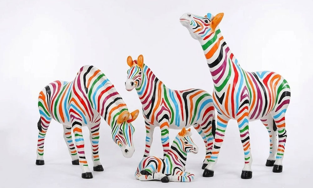 Large Outdoor Zebra Statues with Colorful Stripes